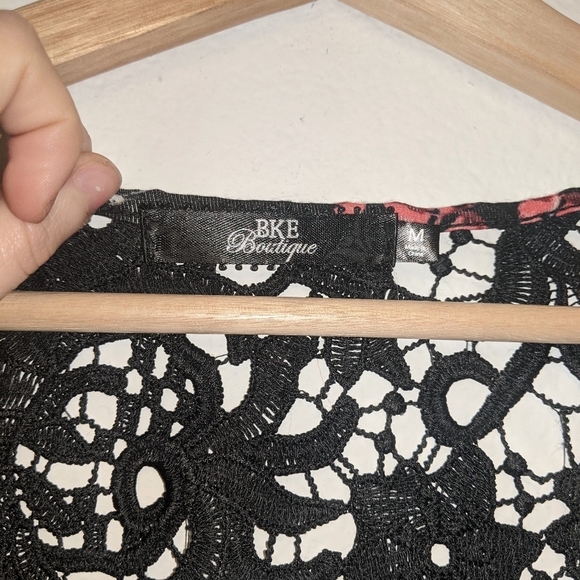 BKE Cold Shoulder Eyelet Lace Floral Tassel Shirt - Picture 7 of 9